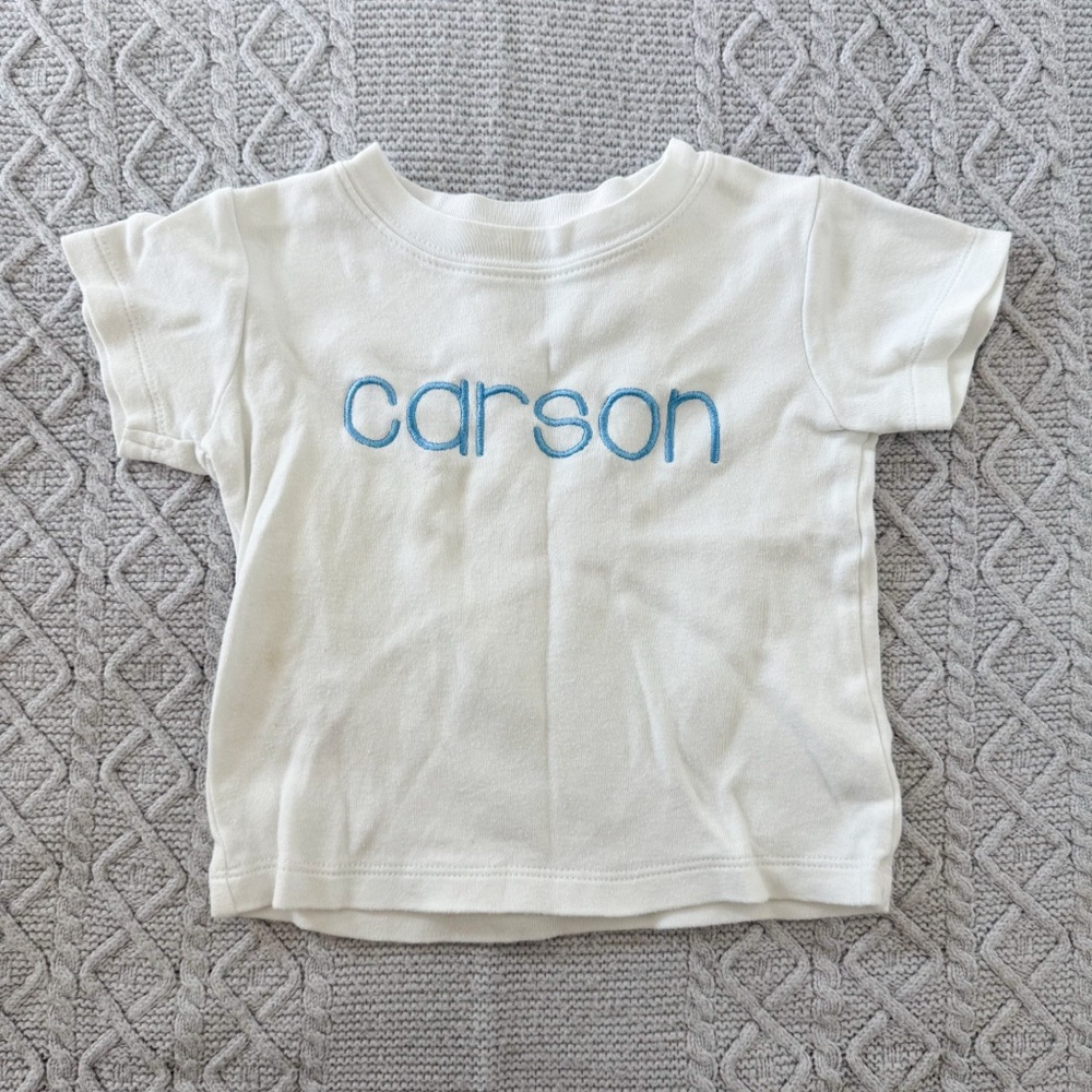 White Baby T-Shirt with Blue Custom Embroidered Name Carson